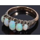 A 9ct gold graduated five stone opal cabochon ring