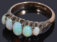 A 9ct gold graduated five stone opal cabochon ring