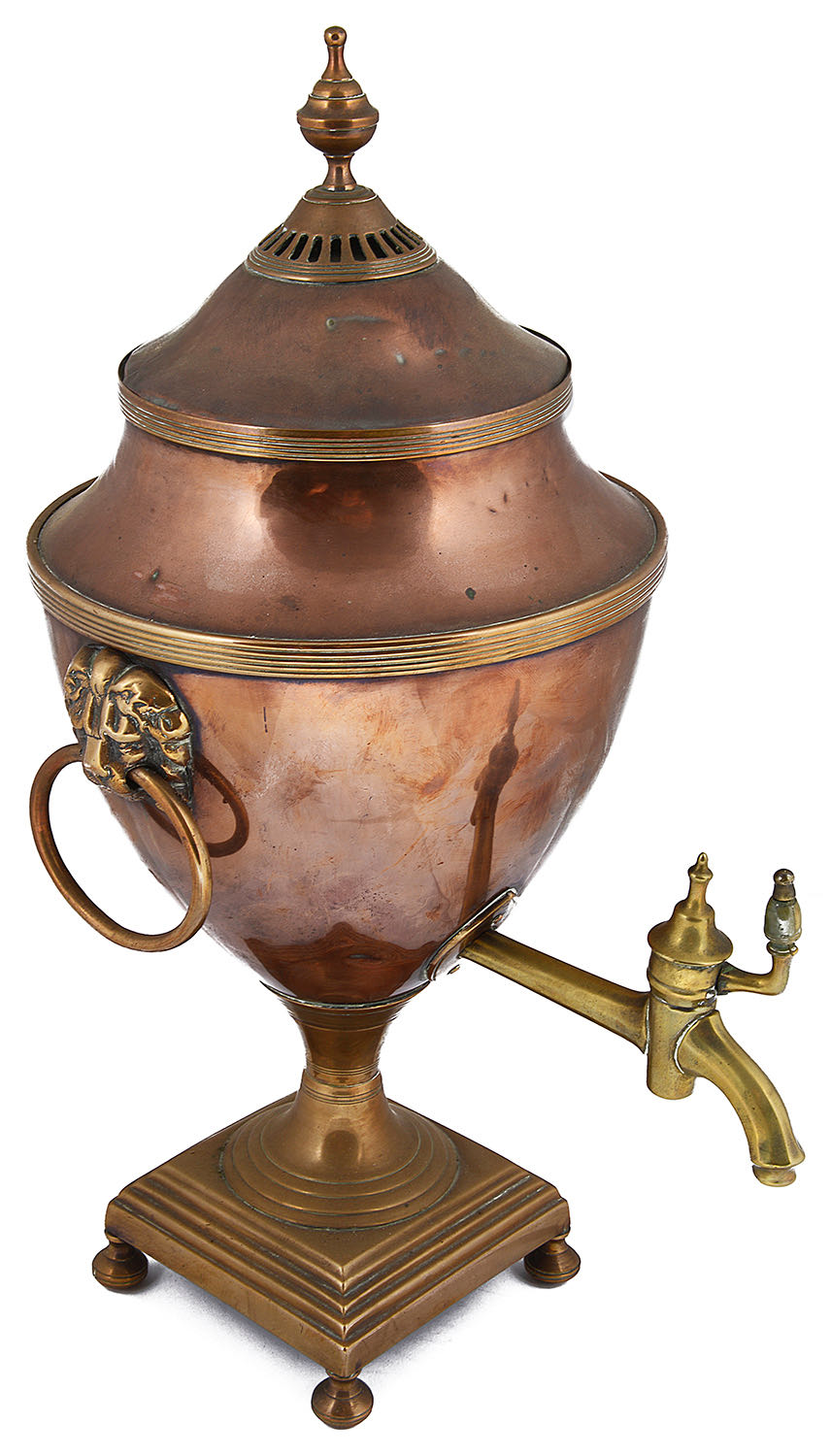 A George III copper and brass tea urn