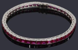 A white gold synthetic ruby line bracelet