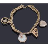Edwardian gold turquoise and split pearl three row gate link bracelet with four charms