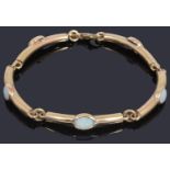 A 9ct gold opal set bar link bracelet