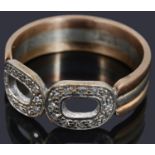 A two colour gold diamond set ring