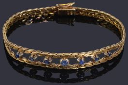 A gold sapphire chain bracelet