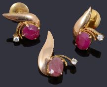 A pair of attractive gold ruby and diamond spray earrings and a matching pendant