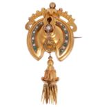 A Victorian gold green stone and seed pearl shield brooch, c.1860