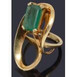 A gold single stone emerald ring