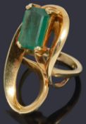 A gold single stone emerald ring