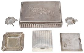 An Art Deco silver table cigarette box; others