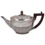 A late Victorian silver presentation teapot