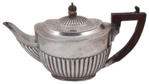 A late Victorian silver presentation teapot