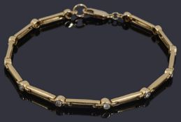 A gold diamond set bar link bracelet