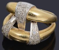 A gold two row diamond set band ring