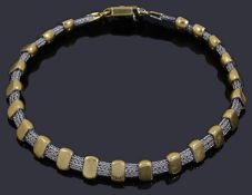 A Portuguese two colour gold bracelet