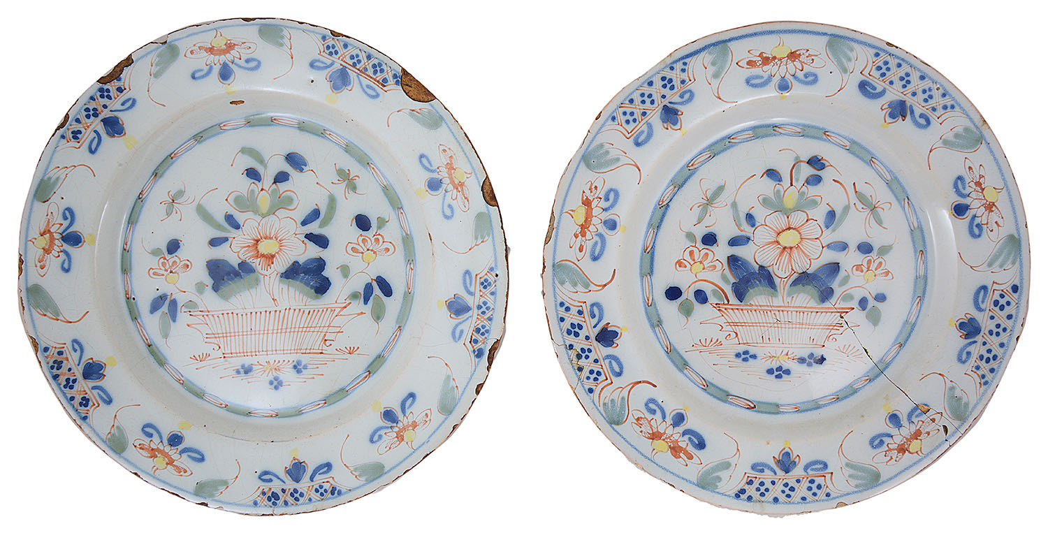 A pair of mid 18th century English polychrome Delft plates