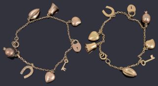 Two gold charm bracelets with assorted charms