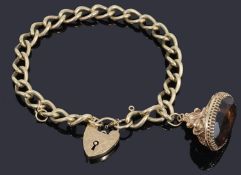 A 9ct gold curb link charm bracelet with padlock