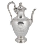 A Victorian Grecian style silver coffee pot