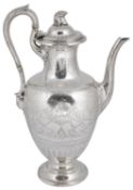 A Victorian Grecian style silver coffee pot