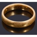 A 22ct gold court shaped wedding ring