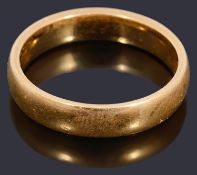 A 22ct gold court shaped wedding ring