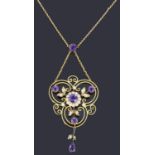 A delicate Edwardian gold amethyst and seed pearl open pendant necklace