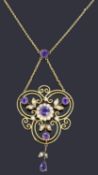 A delicate Edwardian gold amethyst and seed pearl open pendant necklace