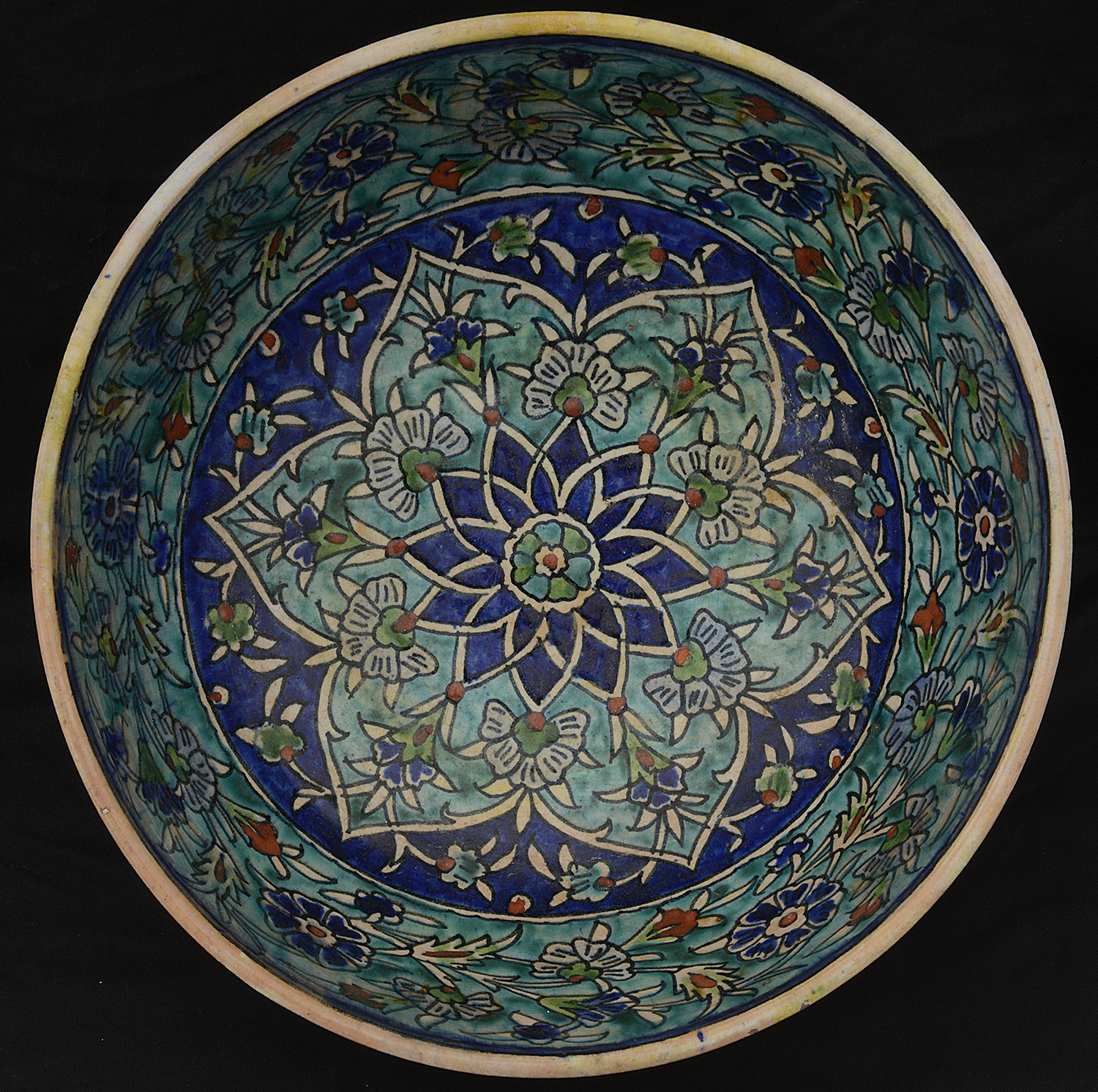 A large 19th century Iznik pottery polychrome tin glazed bowl - Image 2 of 6