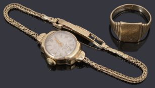 A ladies gold Record mechanical strap watch and a 9ct gold signet ring