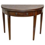 A George III mahogany demi-lune fold over tea table