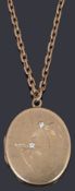 A 9ct gold oval hinged locket on chain