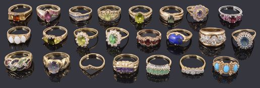 A large collection of contemporary gold mounted gem set rings
