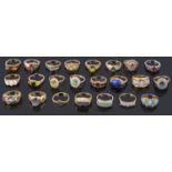 A large collection of contemporary gold mounted gem set rings