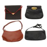 A collection of four designer handbags