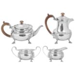 A George VI silver four piece neo-classical style tea service