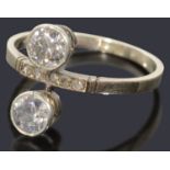 An Art Deco ‘toi et moi’ diamond set ring