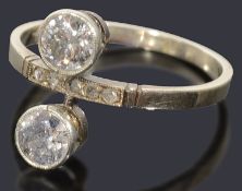 An Art Deco ‘toi et moi’ diamond set ring