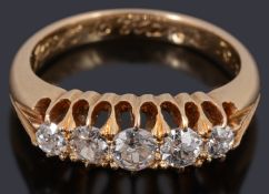 A gold Victorian five stone graduated diamond ring