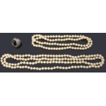 Two single row cultured pearl necklaces,