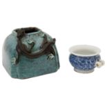 A 19th century Chinese Qing Dynasty Robins egg glazed brush washer and a blue and white bird feeder
