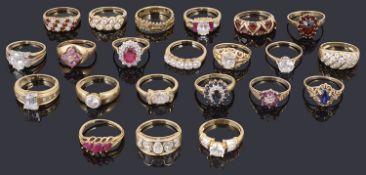 A large collection of contemporary gold mounted gem set rings