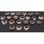 A large collection of contemporary gold mounted gem set rings