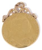 A George III Guinea dated 1784, with soldered pendant mount and bale