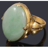 A Chinese gold jade ring