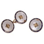 A single mother of pearl and enamel cufflink marked 18