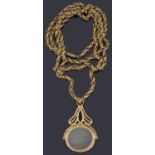 A Victorian gilt metal textured prince of Wales chain with fob