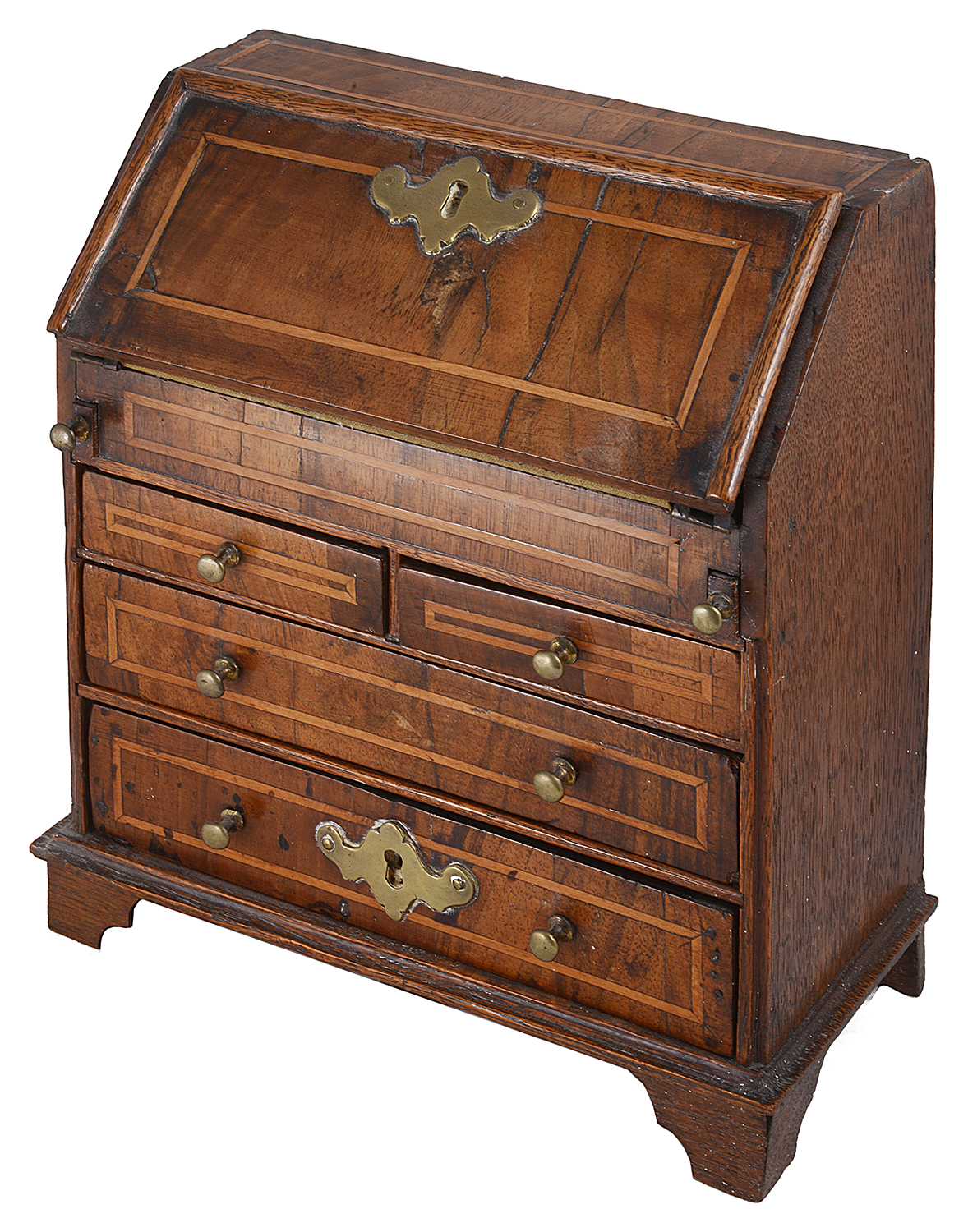 A 19th century George II style miniature walnut and oak bureau