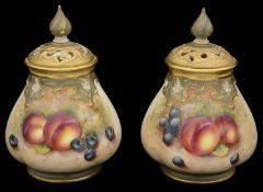 A pair of Royal Worcester pot pourri vases and covers