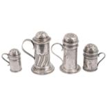 Four Victorian and later silver pepper dredgers in the form of kitchen pepper pots