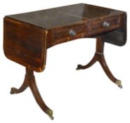A late George III Brazilian rosewood and sycamore strung sofa table in the manner of Gillow c.1800